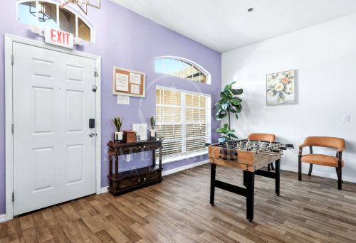 Inviting community lounge at Safe Harbor Amoré senior care home in Spring Hill, Florida